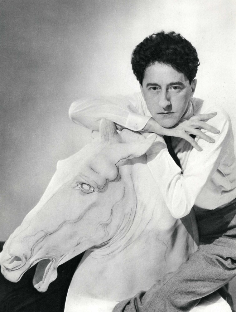 Lot #652: GEORGE HOYNINGEN-HUENE - The Poet Jean Cocteau on a Plaster Horse - Original vintage photogravure