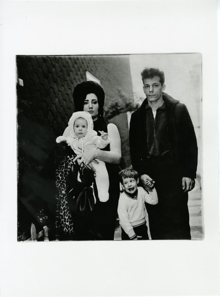 Lot #3285: DIANE ARBUS - Young Brooklyn Family Going for a Sunday Outing, New York - Original photogravure