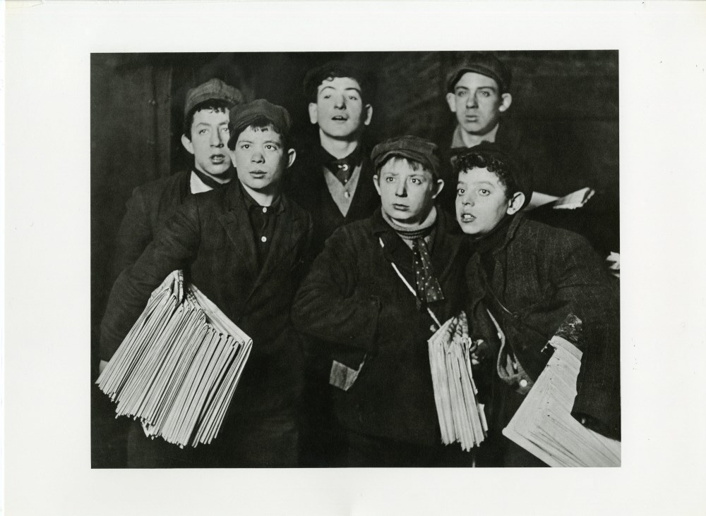 Lot #2197: LEWIS HINE - Group of "Newsies" at the Brooklyn Bridge Starting Out at 1:00am in a Blizzard on a Sunday - Original photogravure