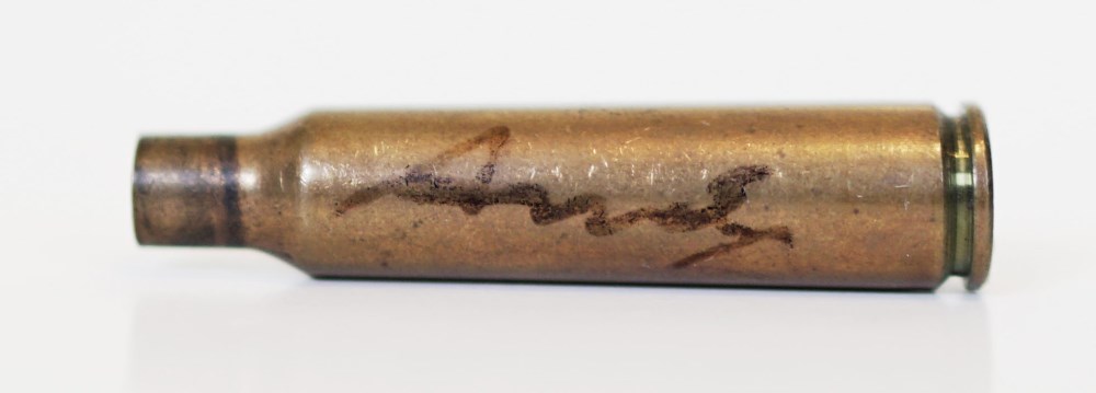 Lot #2471: ANDY WARHOL - Shell Casing - Brass shell casing (spent cartridge)