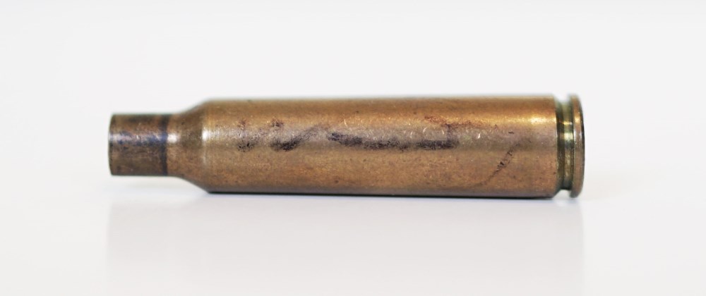 Lot #2471: ANDY WARHOL - Shell Casing - Brass shell casing (spent cartridge)