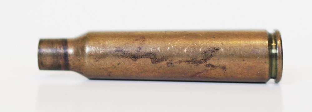 Lot #2471: ANDY WARHOL - Shell Casing - Brass shell casing (spent cartridge)