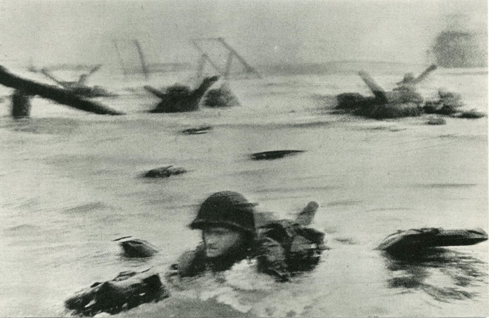 Lot #477: ROBERT CAPA - Omaha Beach, Normandy, France: D-Day, June 6, 1944 - Original photogravure