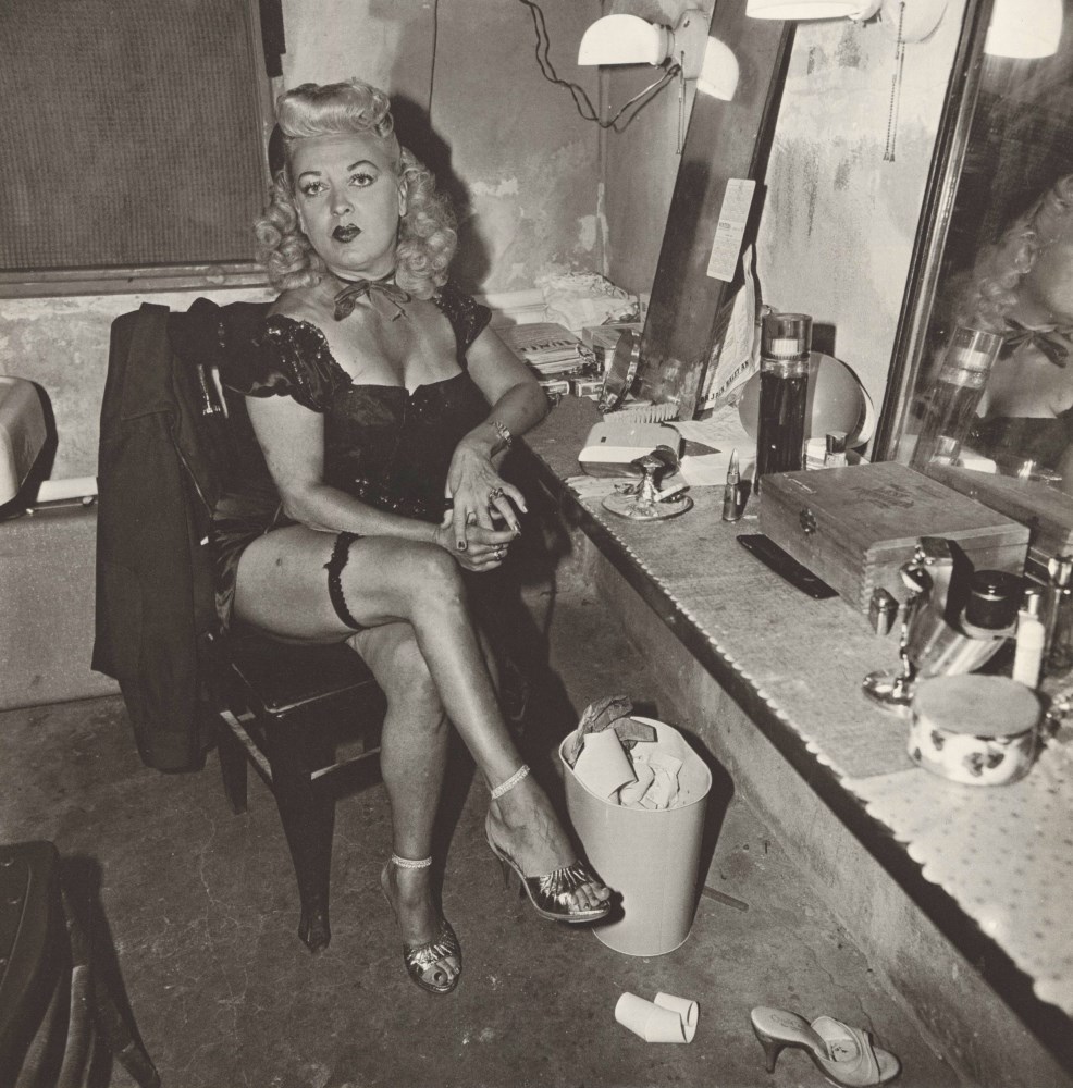 Lot #80: DIANE ARBUS - Burlesque Comedienne in Her Dressing Room, Atlantic City, N.J - Original vintage photogravure