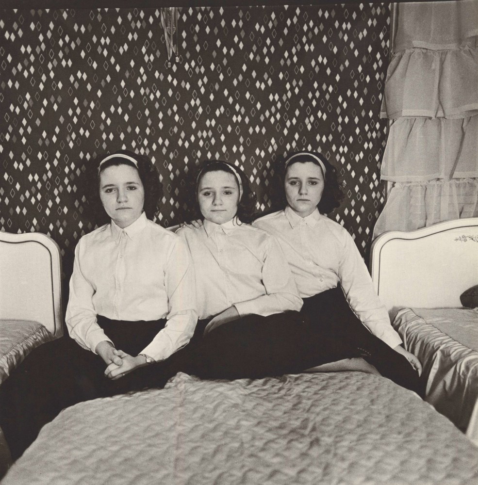 Lot #674: DIANE ARBUS - Triplets in Their Bedroom, N.J - Original photogravure