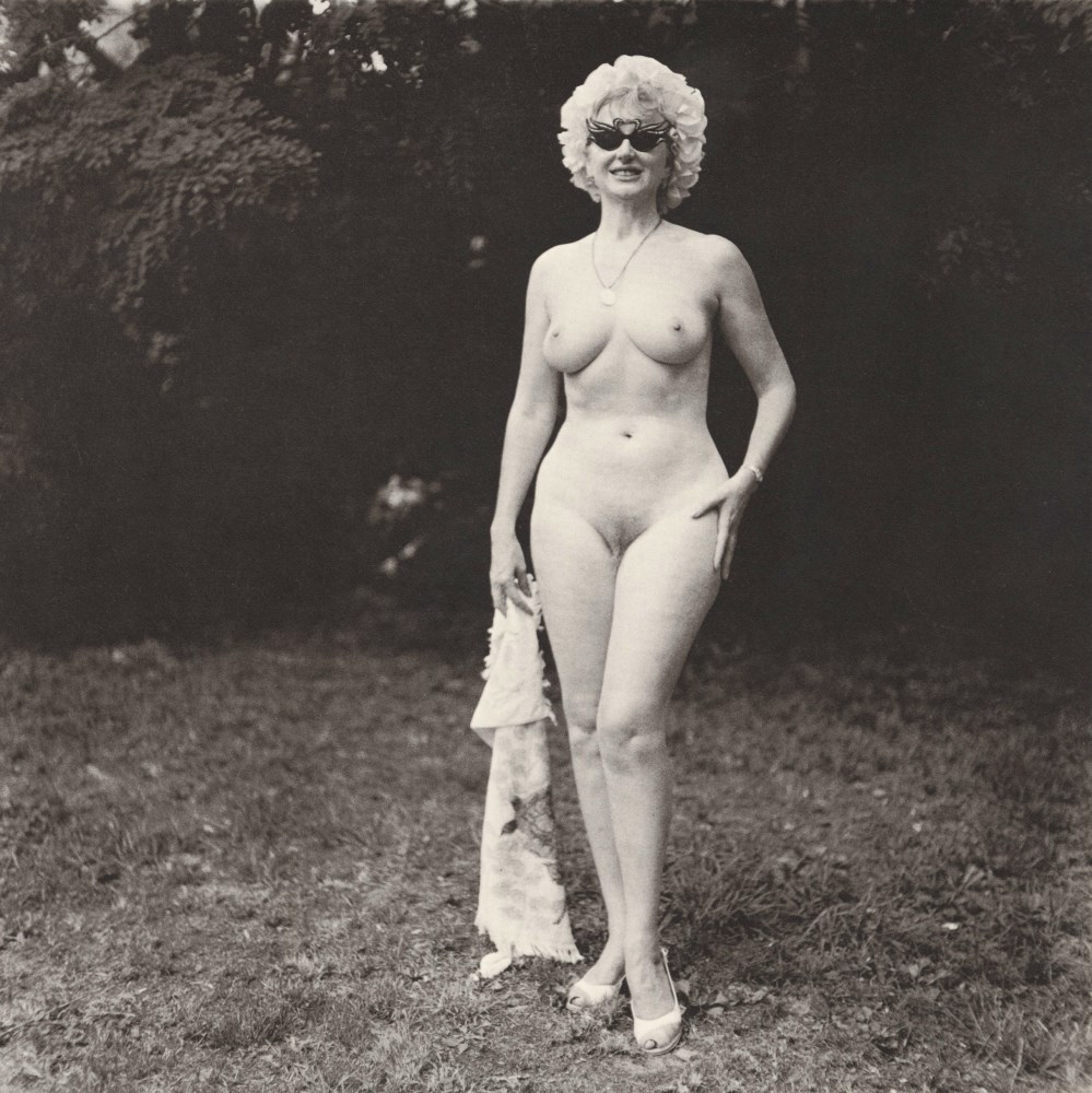 Lot #470: DIANE ARBUS - Nudist Lady with Swan Sunglasses, PA - Original photogravure