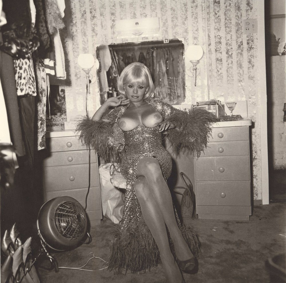 Lot #1435: DIANE ARBUS - Topless Dancer in Her Dressing Room, San Francisco, CA - Original vintage photogravure