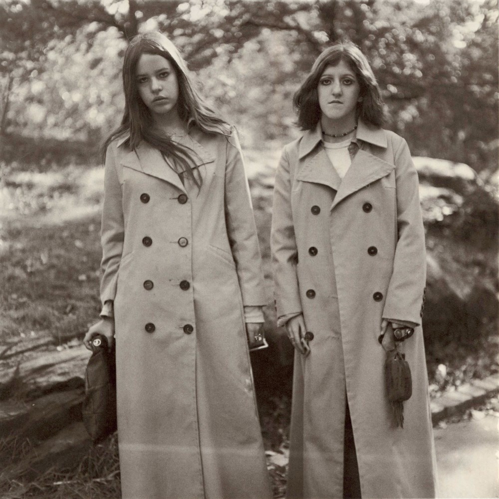Lot #1450: DIANE ARBUS - Two Girls in Identical Raincoats, Central Park, N.Y.C - Original vintage photogravure