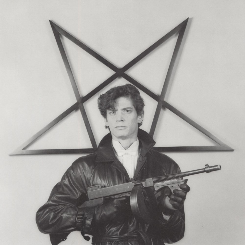 Lot #2071: ROBERT MAPPLETHORPE - Self-portrait with Gun and Star - Original vintage photogravure