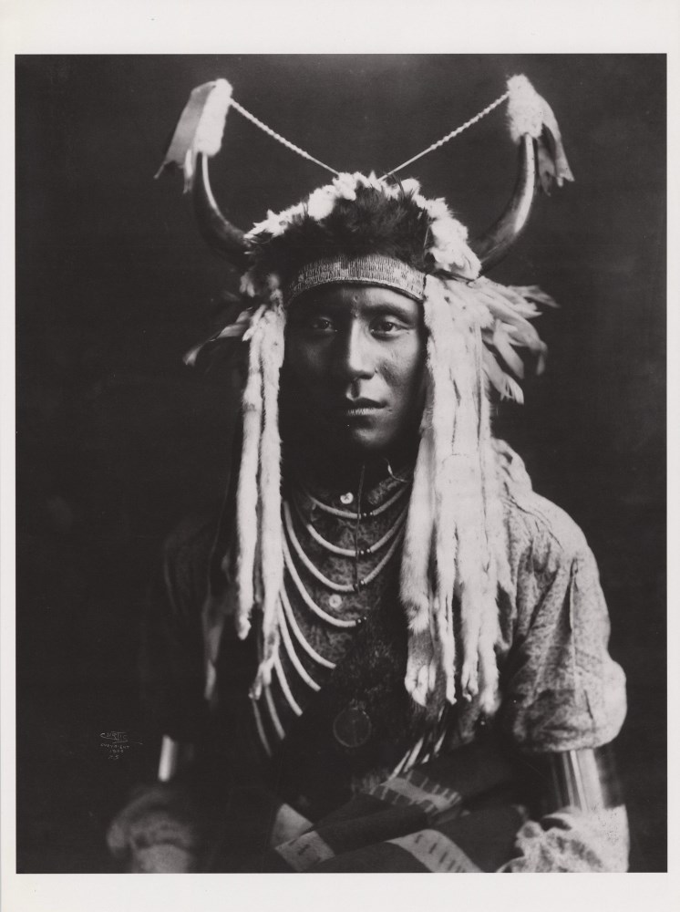 Lot #1749: EDWARD S. CURTIS - Head Carry, Blackfoot - Original photogravure