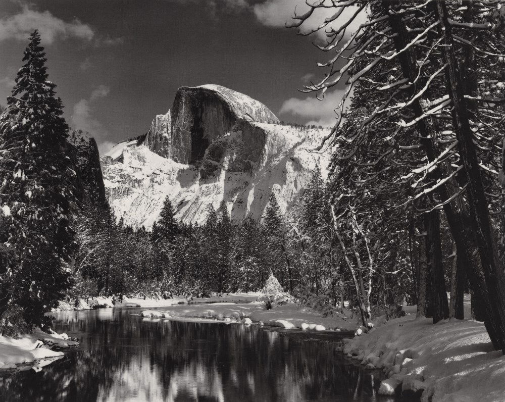Lot #1030: ANSEL ADAMS - Half Dome, Merced River, Winter, Yosemite National Park - Original photogravure