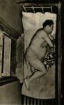 Lot #2136: WEEGEE [arthur h. fellig] - Tenement Penthouse - Original vintage photogravure