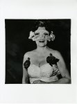 Lot #432: DIANE ARBUS - Lady at a Masked Ball with Two Roses on Her Dress, N.Y.C - Original photogravure