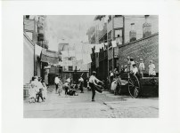 Lot #1702: LEWIS HINE - An Early Type of Playground for Tenement Children - Original photogravure