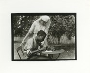 Lot #2822: LEWIS HINE - Red Cross Nurse and Man with Artificial Arm, France - Silver gelatin print