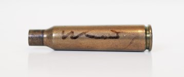 Lot #2914: ANDY WARHOL - Shell Casing - Brass shell casing (spent cartridge)