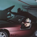 Lot #1386: HELMUT NEWTON - Cecilia and BMW ZI, Monte-Carlo, 1991 - Original vintage color photolithograph