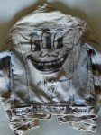 Lot #1832: KEITH HARING [imput&#233;e] - Levi Jacket drawing: Three Eyed Smiling Face - Black marker drawing on denim textile