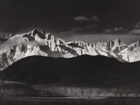 Lot #1494: ANSEL ADAMS - Winter Sunrise, the Sierra Nevada from Lone Pine, California - Original photogravure